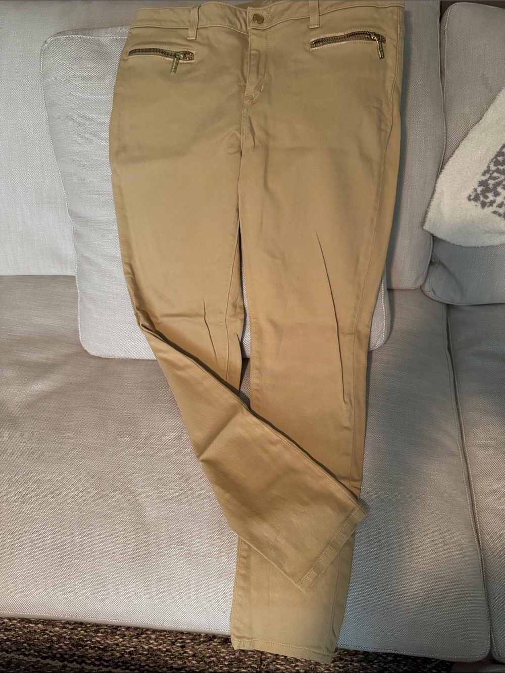 Women’s SkinnyFit mustard colored jeans with Zip Pockets